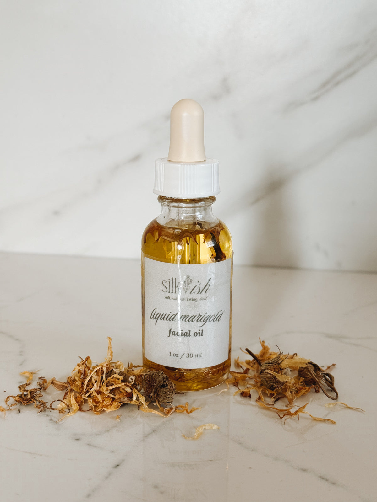 liquid {mari}gold facial oil